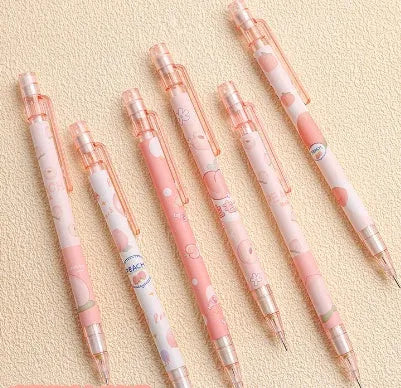 Automatic press pencil in peach colour with 0.5mm lead and refill set