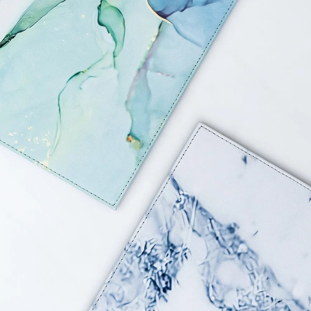 Silicone printing tablet pad in four colours on a desk with a tablet