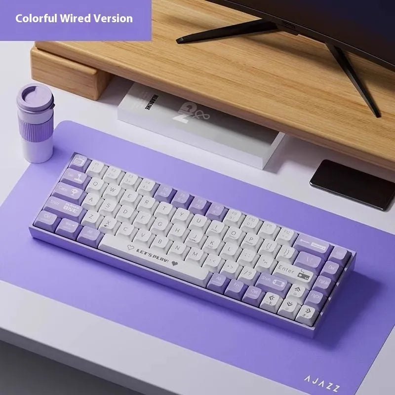 Ajazz AK680 red and white mixed colour hot-swappable mechanical gaming keyboard on a desk.
