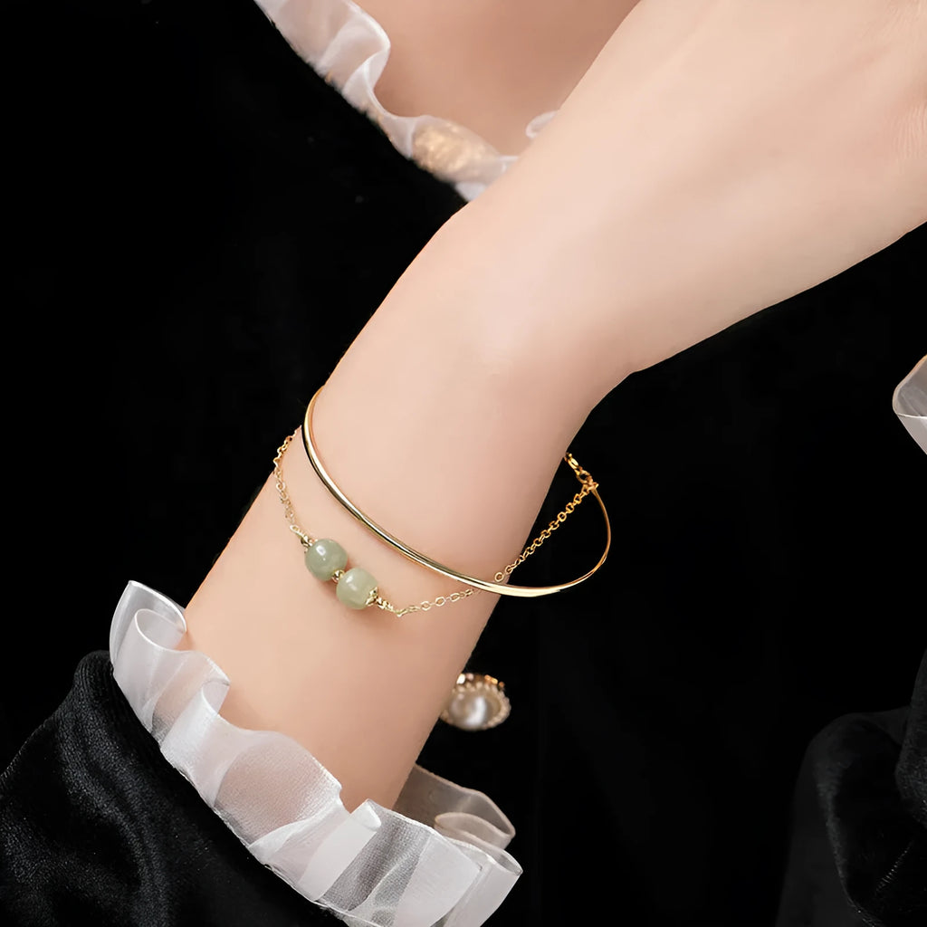 Women's jade lucky beads bracelet with gold inlay design in single, double, and three bead versions