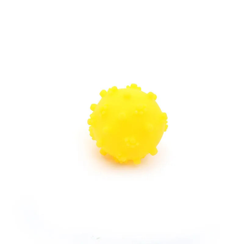 Set of four bright blue, green, pink, and yellow 2-inch squeaky dog toy balls with a textured, dimpled surface.