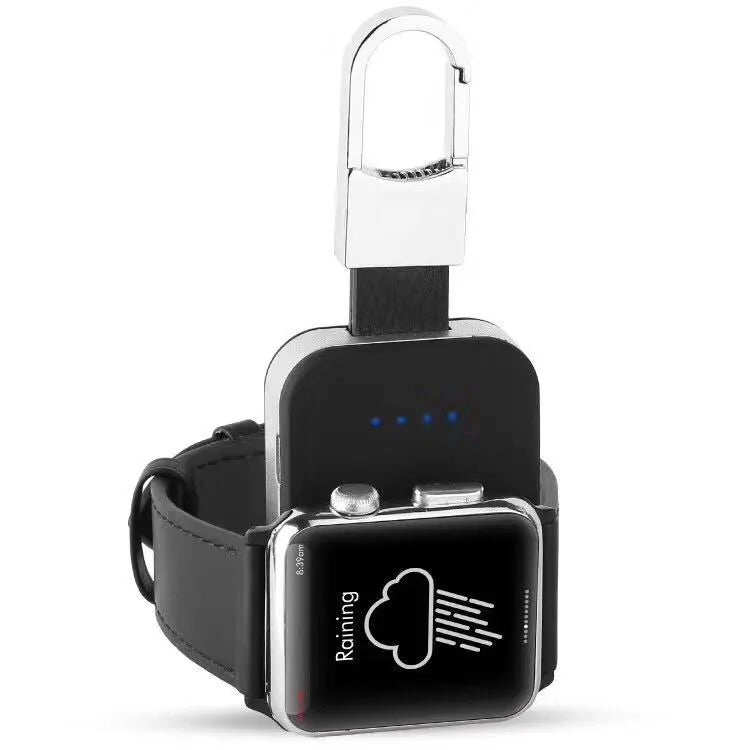 Black Apple Watch portable wireless power bank on a keyring showing compact size.