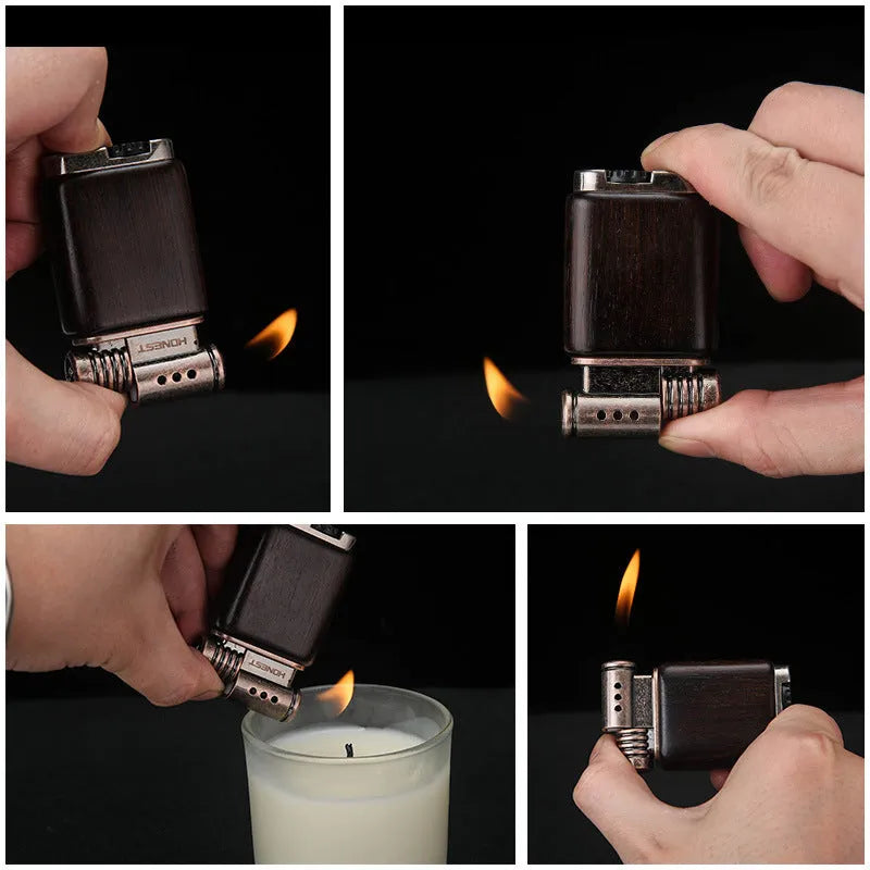 A decorative gas lighter with a carved wooden handle combining black wood, rosewood symbols, and a red wood tube accent.