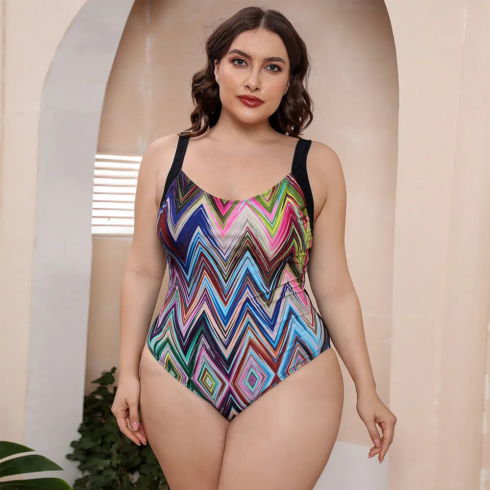 Floral print one-piece swimsuit with spaghetti straps and conservative vest design