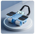 Black automatic rebound abdominal wheel with four wheels on a hardwood floor