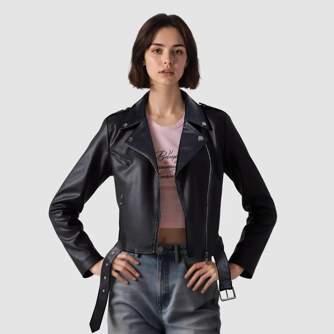 Woman wearing a red PU leather jacket with an adjustable black lapel belt fastened at the waist.