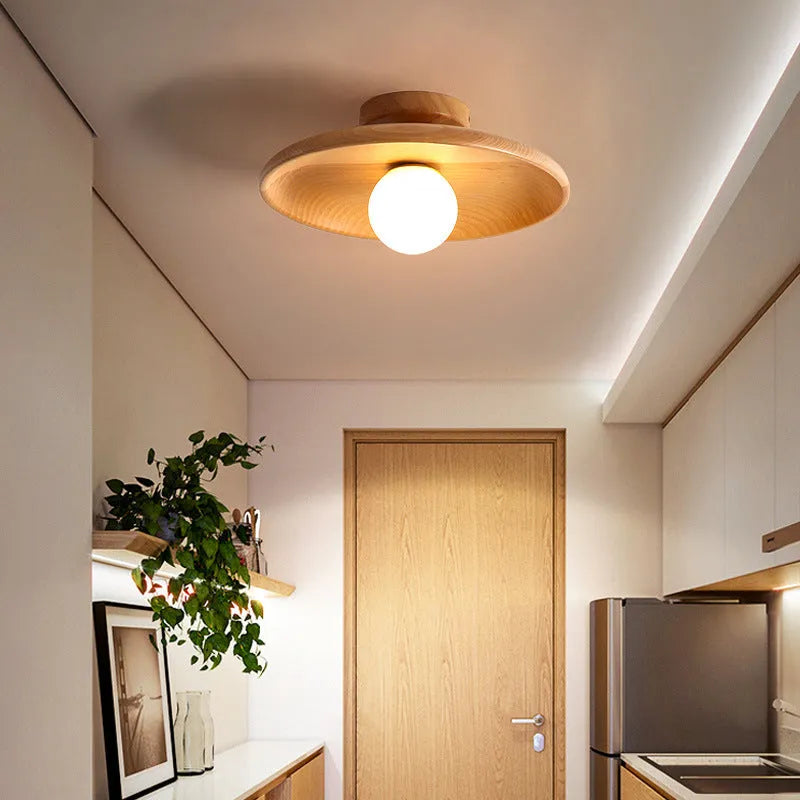 Solid wood modern minimalist ceiling lamp with glass shade in three sizes.