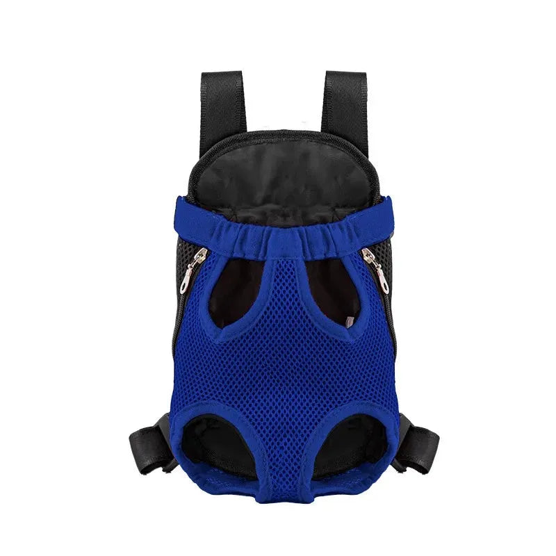 A person wearing a black dog carrier backpack containing a small dog, showing the mesh panels and adjustable straps.