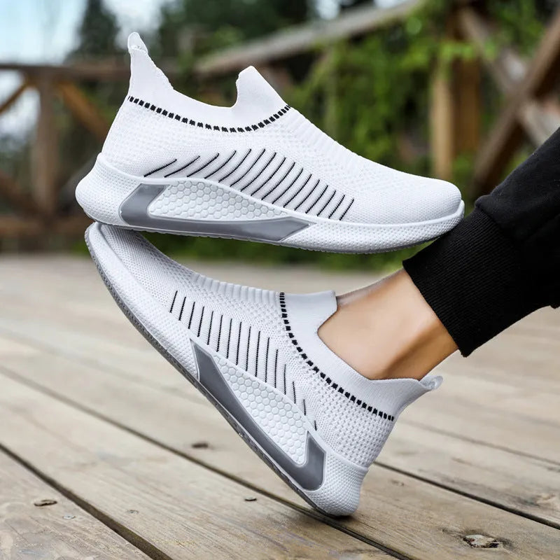 Men's striped mesh sock shoes with Flyknit upper and lace-up closure in black, white and black-white options