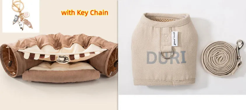Collapsible cloth cat tunnel in Pink colour with visible opening, measuring 45x50x22 cm, on wooden floor