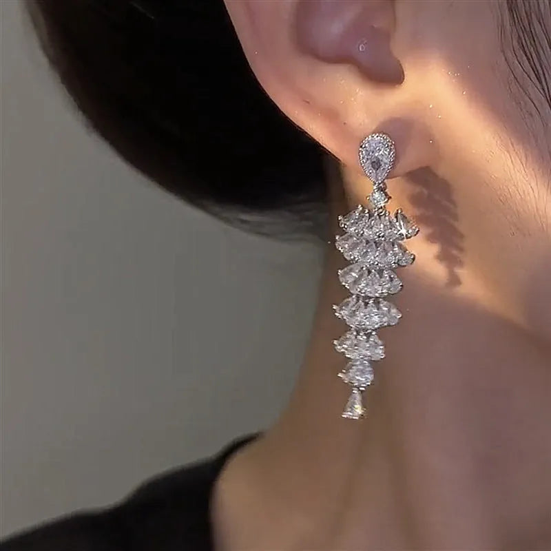Christmas tree drop earrings with zircon stones in silver pagoda colour