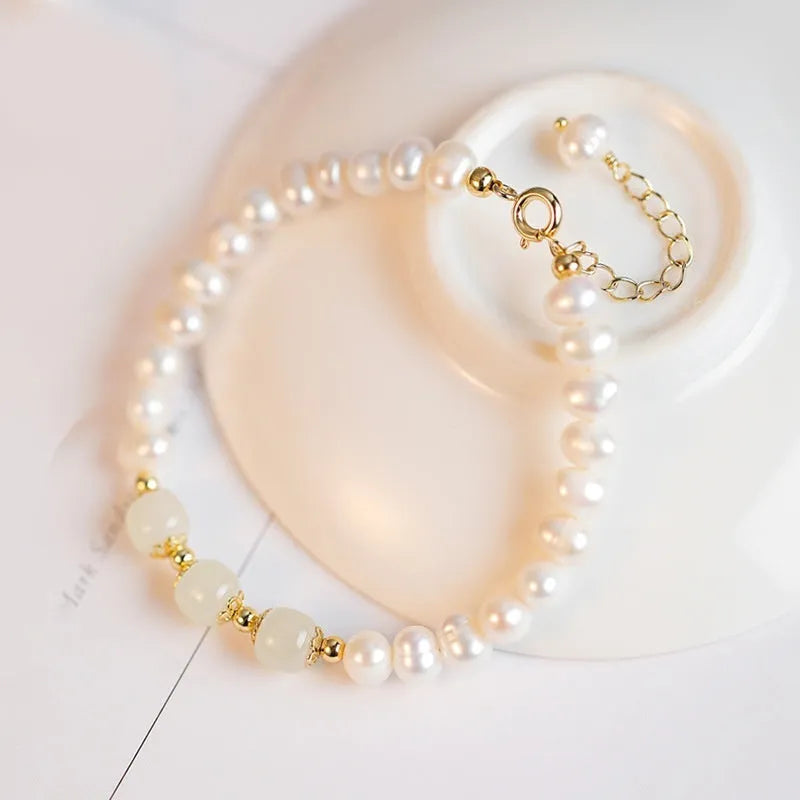 Korean style freshwater pearl bracelet with diamond-shaped beads in Hetian jade green colour.