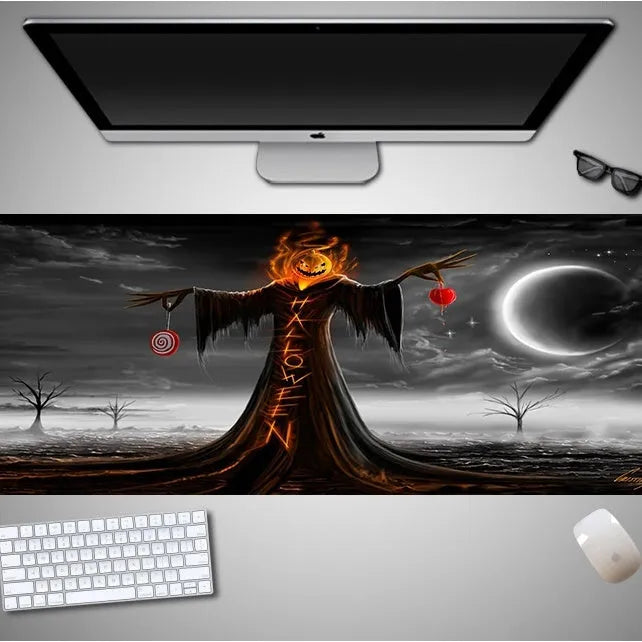 Large Halloween patterned gaming mouse pad on a desk showing non-slip rubber base and extra-long design.