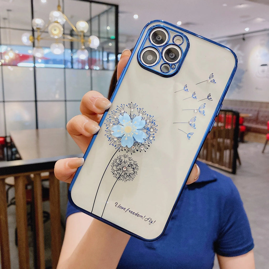 Green iPhone case with 3D floral design and extended kickstand on a table