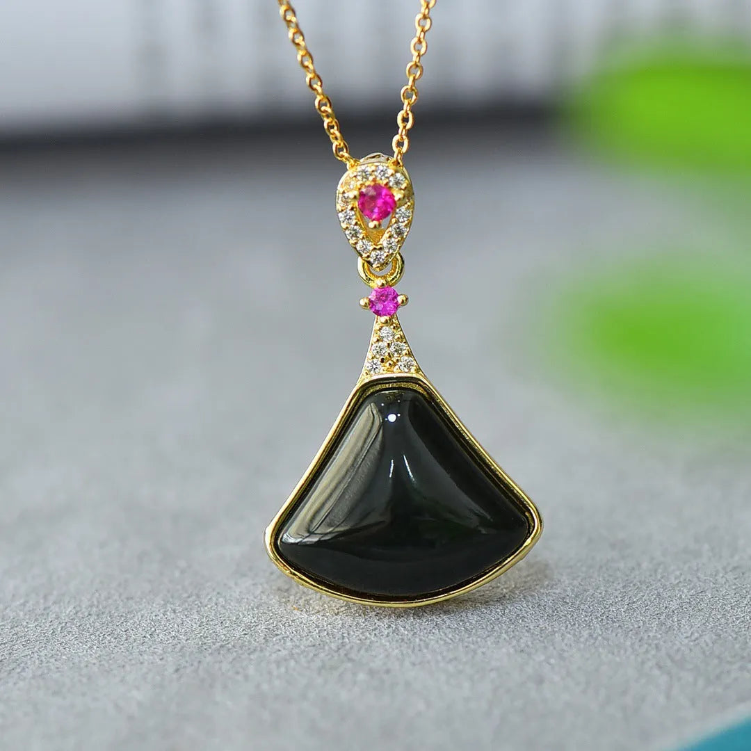 Flat polished Hetian Grey Jade pendant with copper inlay and Ink Blue Jade accents on a necklace.