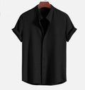 Men's loose-fitting short sleeve summer shirt in a solid colour, made from polyester.
