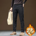 Men's fleece-lined slim fit tapered casual pants in black, cotton fabric, available in sizes 28-40