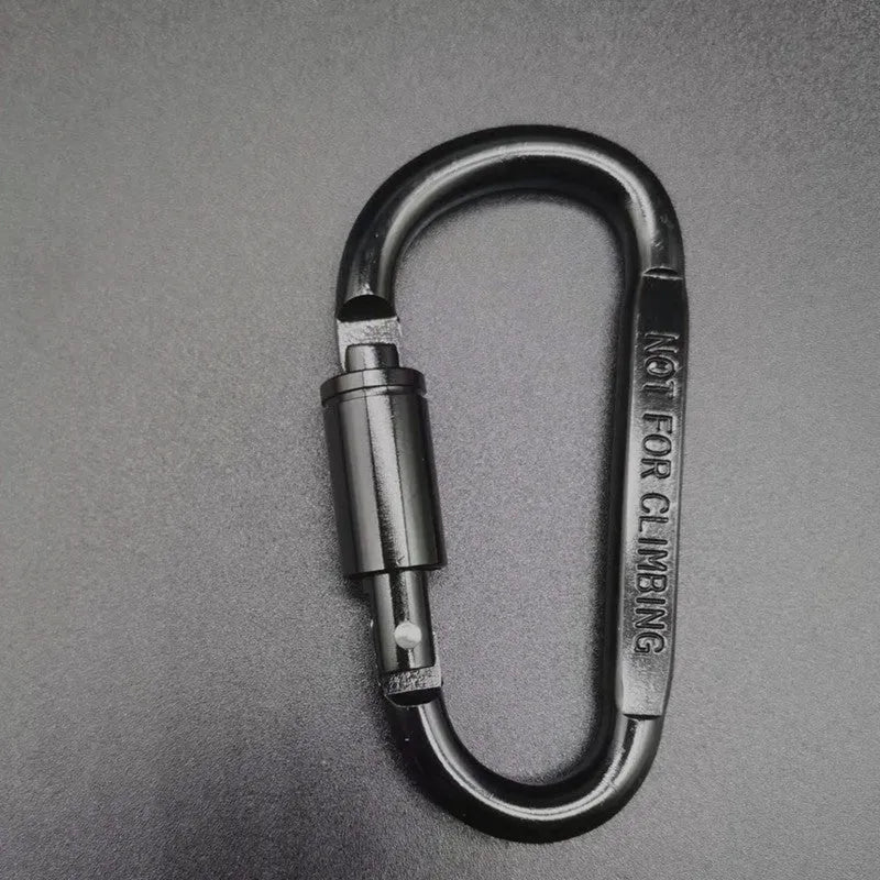 Aluminium D-type screw-lock carabiner in red, showing its 8cm size and flat-sided shape.