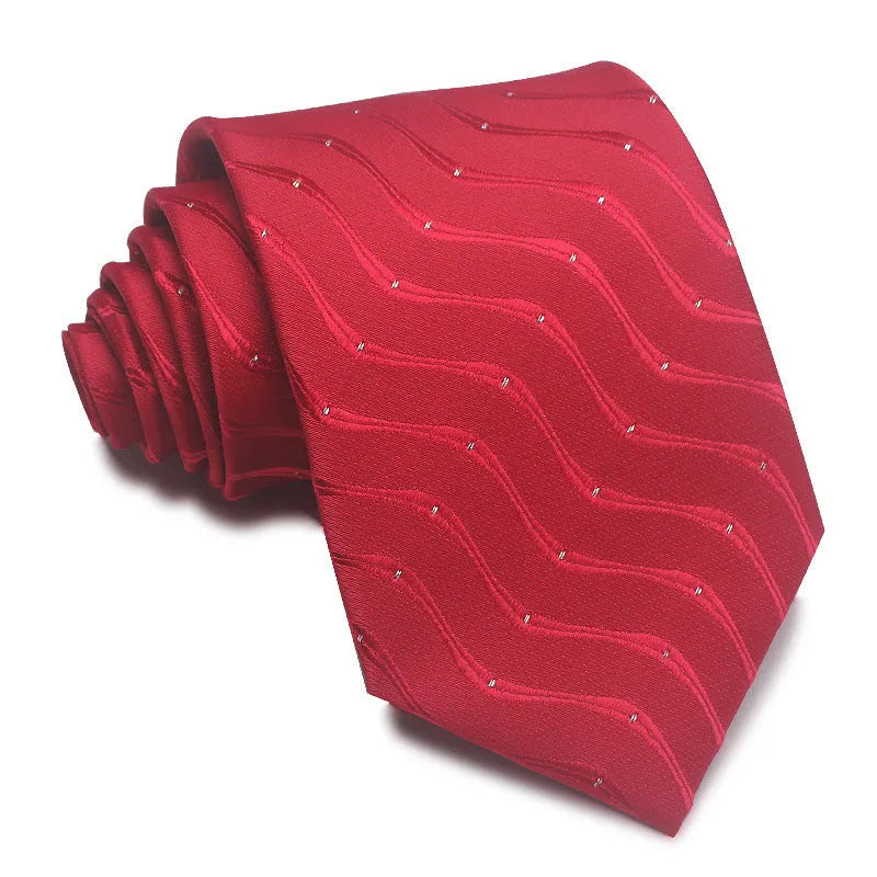 A man's striped formal tie in an arrow style, showing the jacquard texture and width of 7-8 cm.