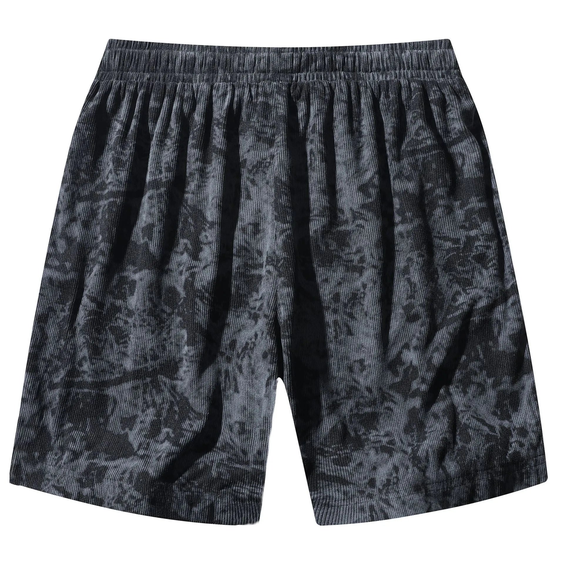 Men's camouflage pattern corduroy athletic shorts with a high waist on a neutral background.