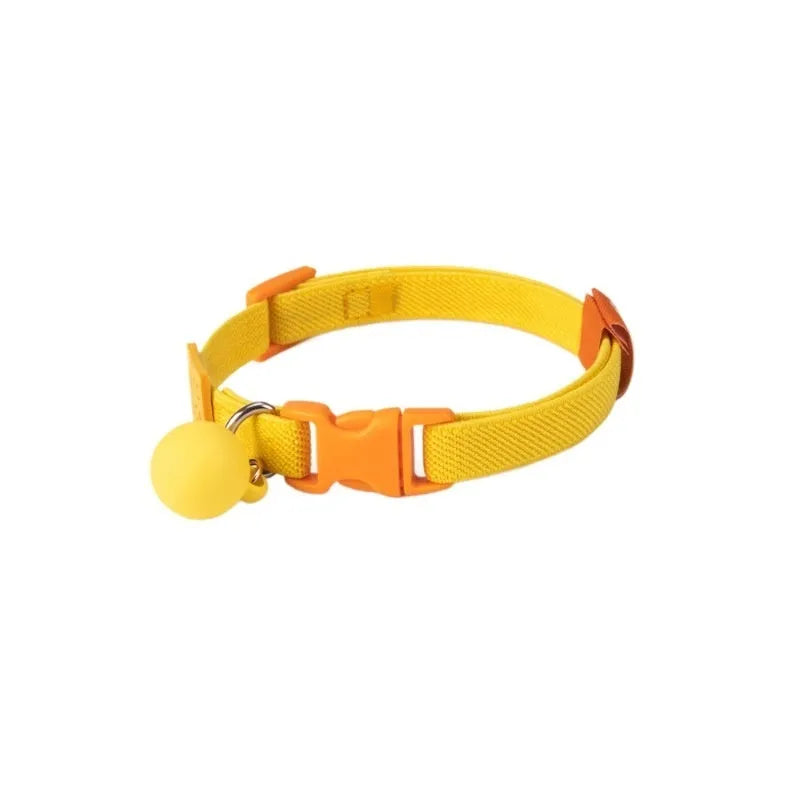 A stretchy yellow polyester dog collar for small breeds, shown adjusted to fit, with a metal D-ring.