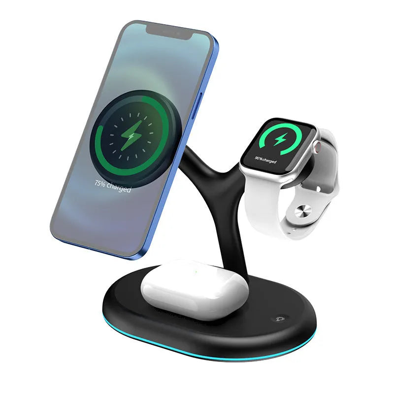 Black magnetic wireless charging stand holding a phone upright on a desk.