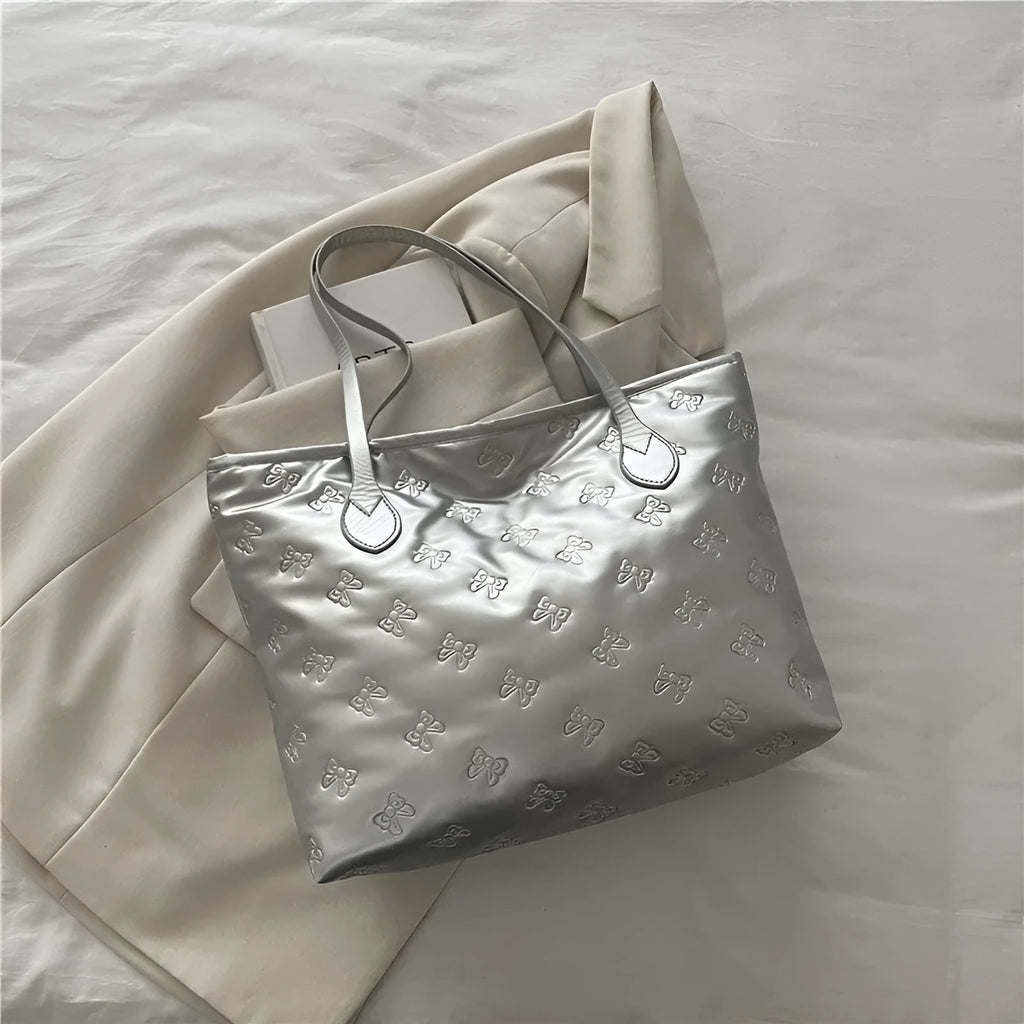 French retro simple embossed PU shoulder bag in black horizontal square shape with double shoulder straps and sewing line detail