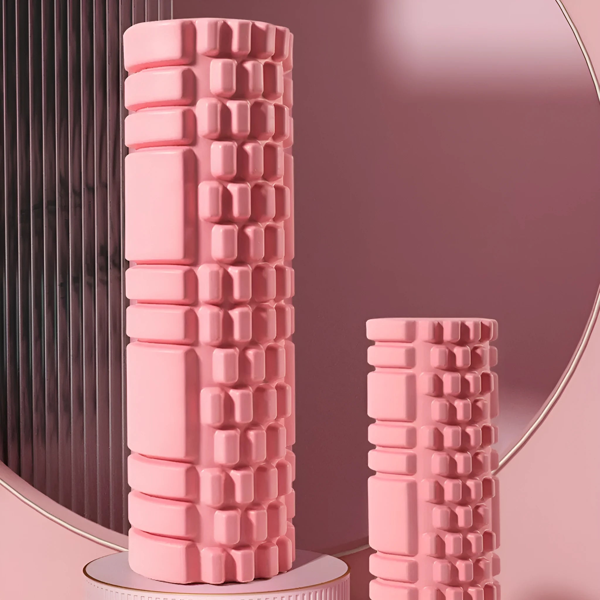 EVA foam roller in assorted colours showing different diameter sizes for fitness recovery.
