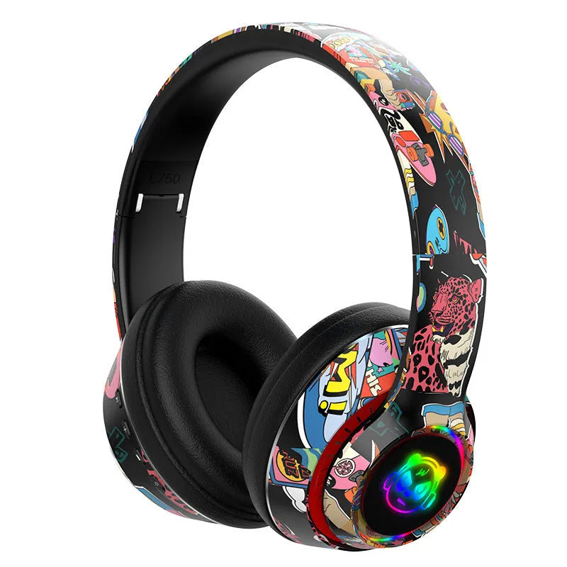 Graffiti wireless Bluetooth headset in black or white, showing head-mounted design.