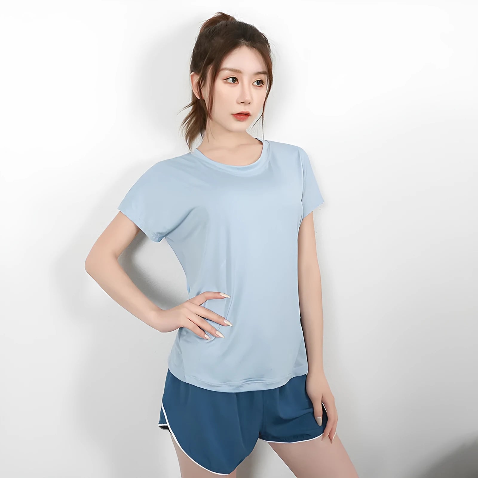 Women's short sleeve polyester sports t-shirt for running fitness cycling in multiple colours
