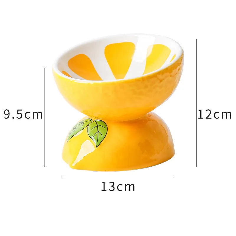 Ceramic elevated cat bowl with tilted design and patterned finish for comfortable pet feeding