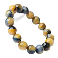 Fantasy tigereye agate bracelet with round beads on a wrist, showing natural stone patterns.