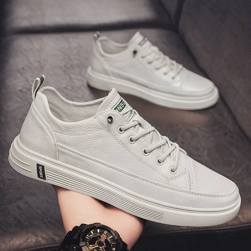 Men's low-heel casual trainers in beige, white, and black colours, showing round toe and Korean style.