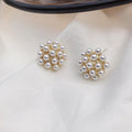 Gold pineapple and starfish pearl Korean style drop earrings with alloy electroplating and inlaid gems.