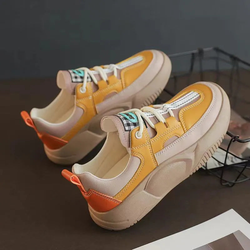 Women's beige thick-soled stitching sneakers with round toe and front lacing on flat heel