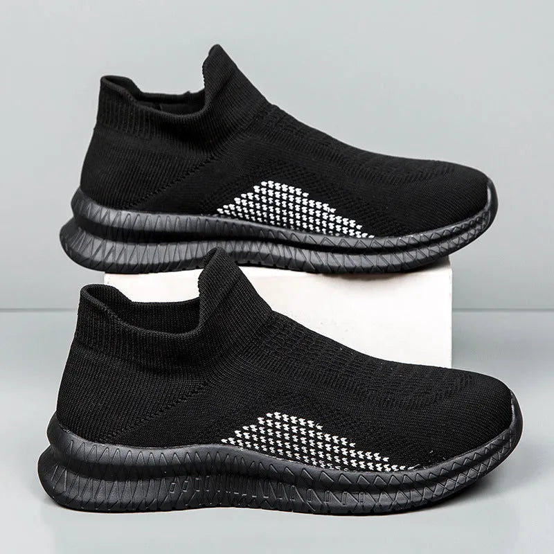 Popcorn Flyknit low-top fabric casual sneaker in solid black, blue, or white with a round toe.
