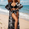 Three-piece women's high-waist swimsuit set with printed pattern, including long shirt cover-up, in black colour option.