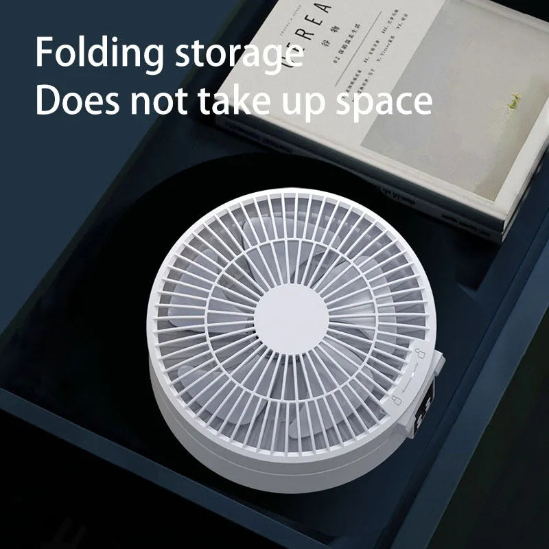 White portable folding fan with remote control, night light, and USB charging cable