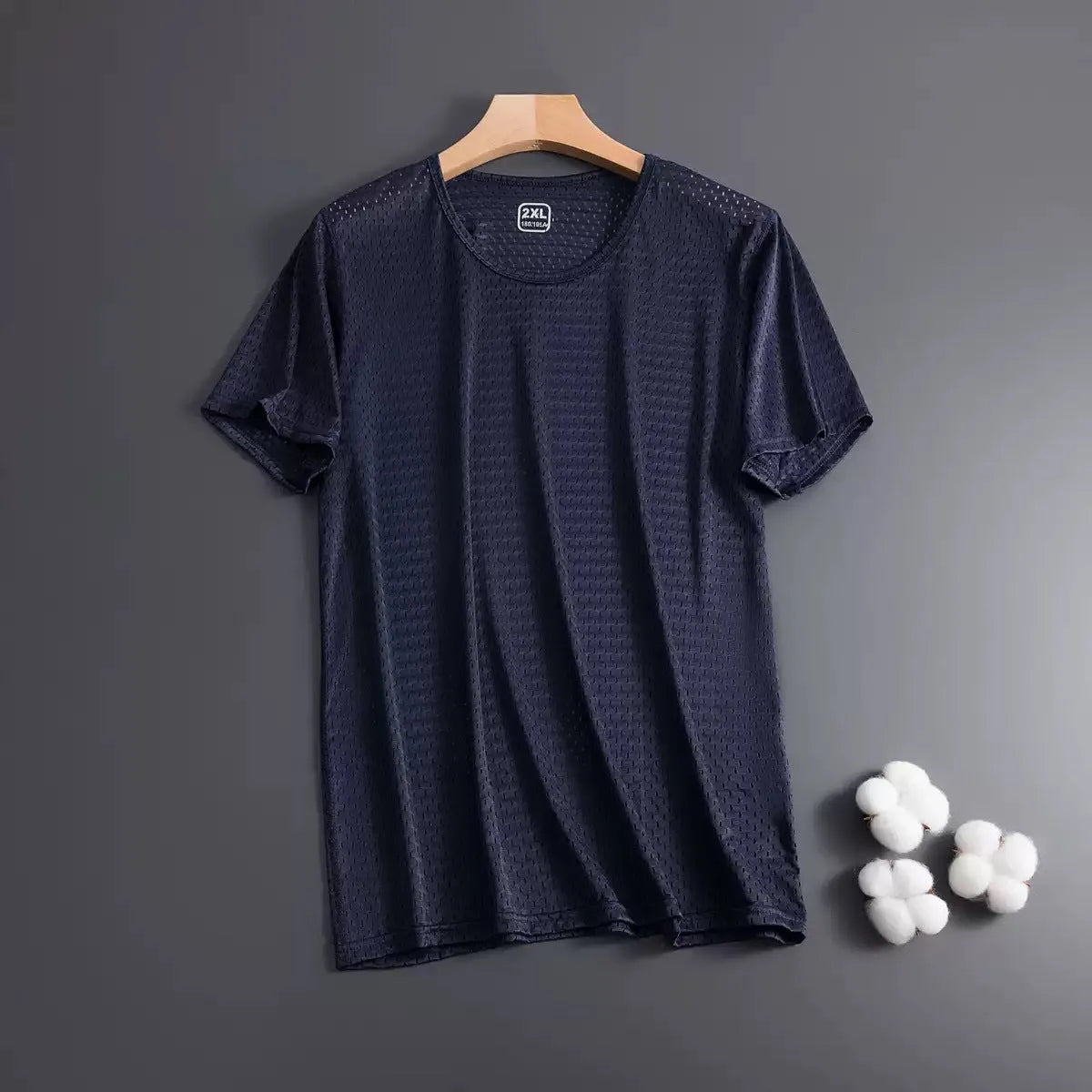 Men's solid colour Ice Silk short sleeve crew neck t-shirt on a hanger.