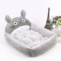 Soft plush cartoon-style sofa bed for a small dog or cat, shown in blue colour.
