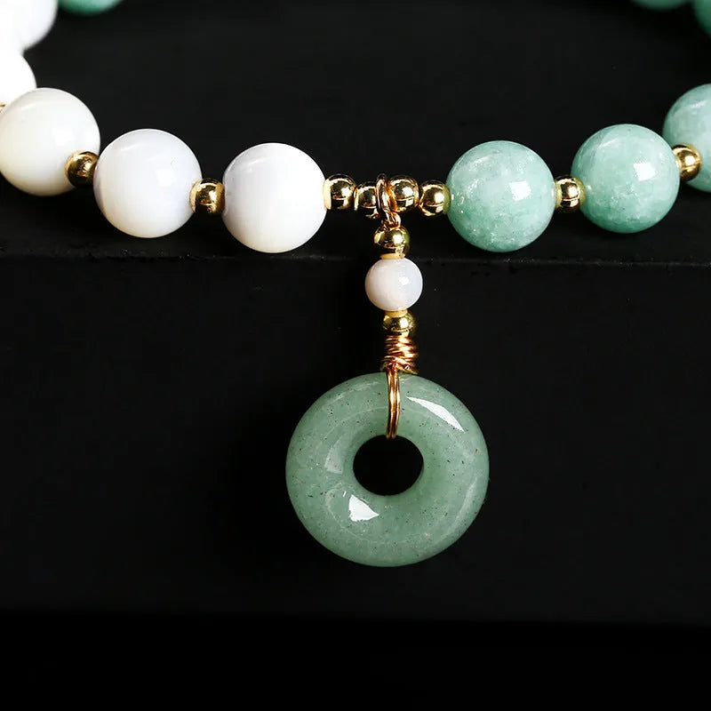 Blue Burma jade bracelet with copper horseshoe screw safety buckle and geometric design