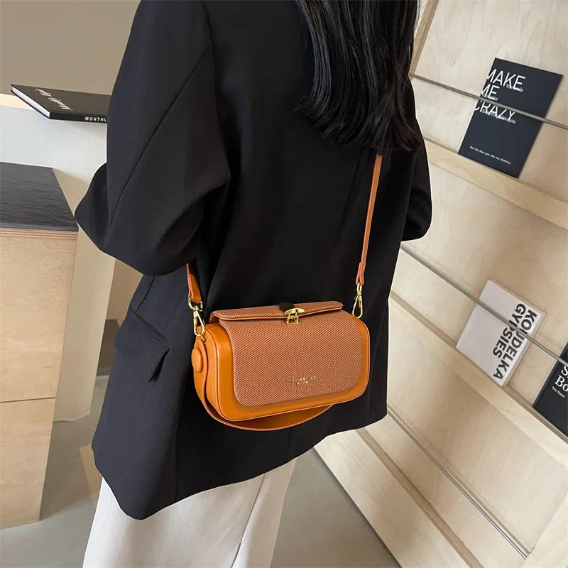 Women's crossbody messenger bag in PU with horizontal square shape and contrast stitching