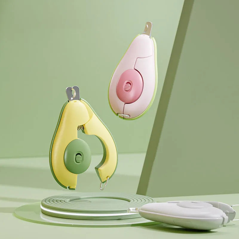 Professional LED pet nail clipper for small dogs and cats in green, pink, or white with safety guard.