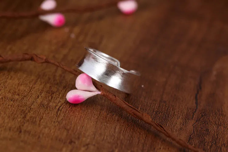 Frosted sterling silver open ring with geometric design and adjustable opening