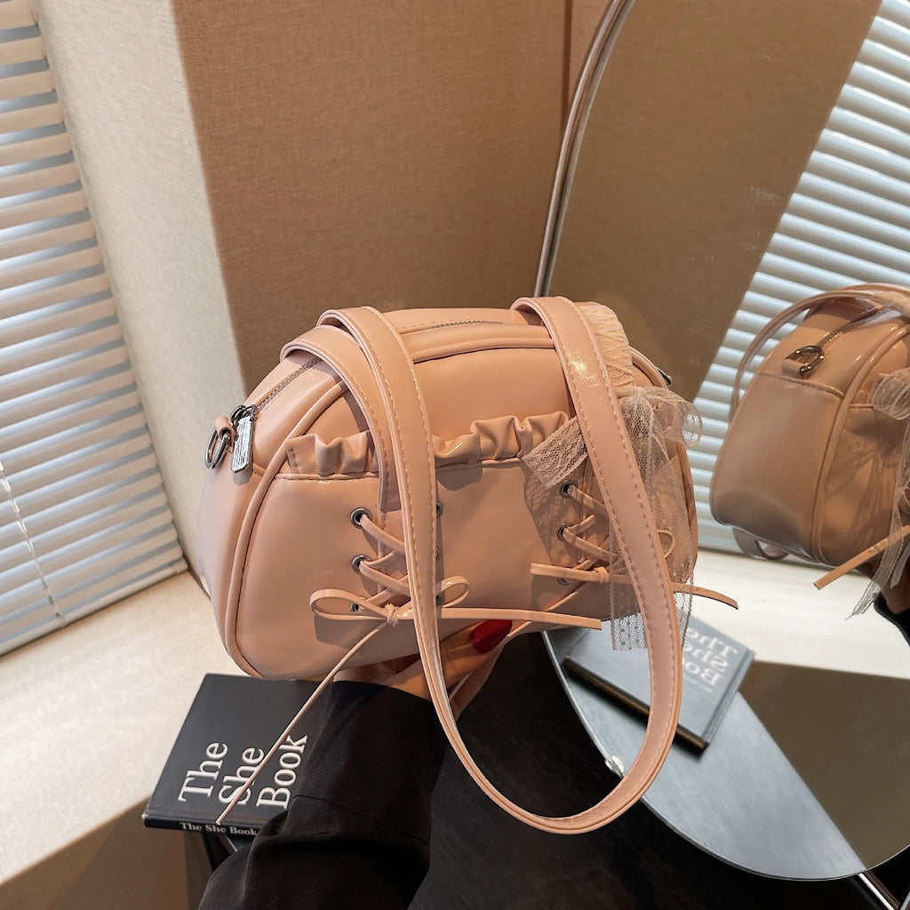 Women's fashion handbag with bow and bandage styling in PU leather, casual shoulder bag design