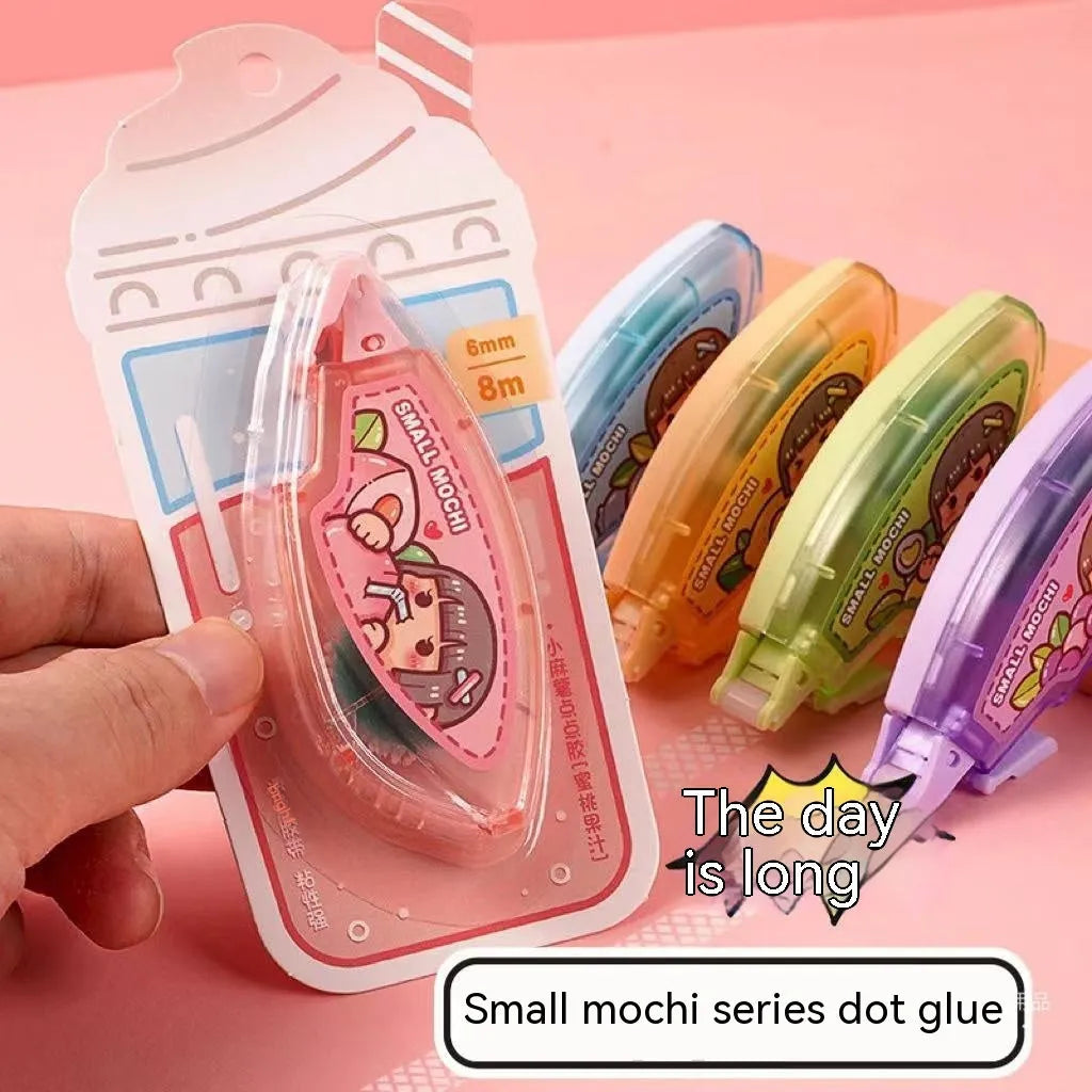 Hand account dotting glue in peach juice colour on card packaging, a high viscosity double-sided adhesive.