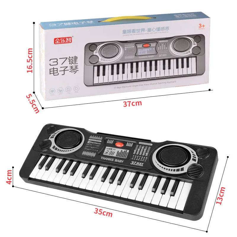 Children's 37-key electronic organ toy in black plastic on a table