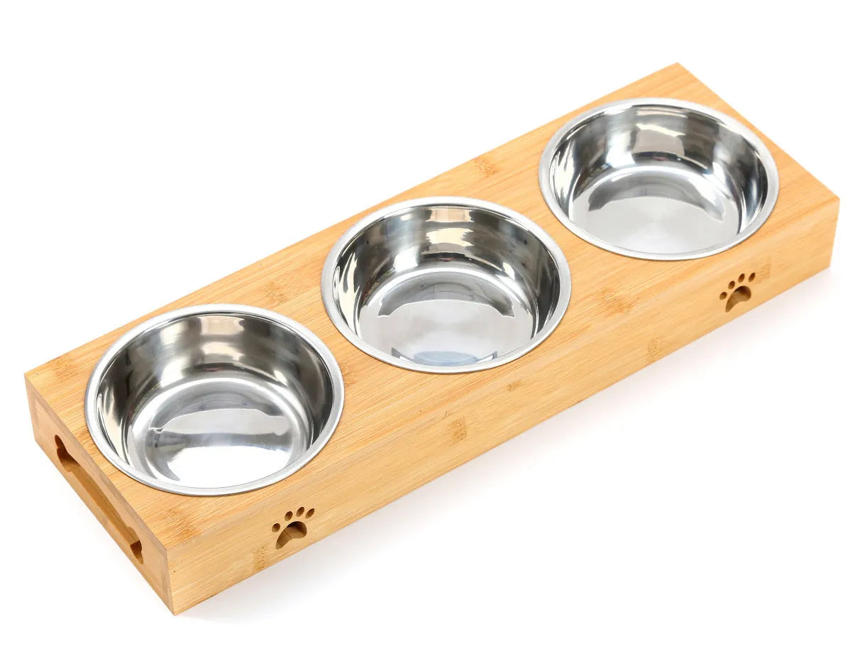 Solid wood pet dining table with stainless steel bowls in elevated feeding station design