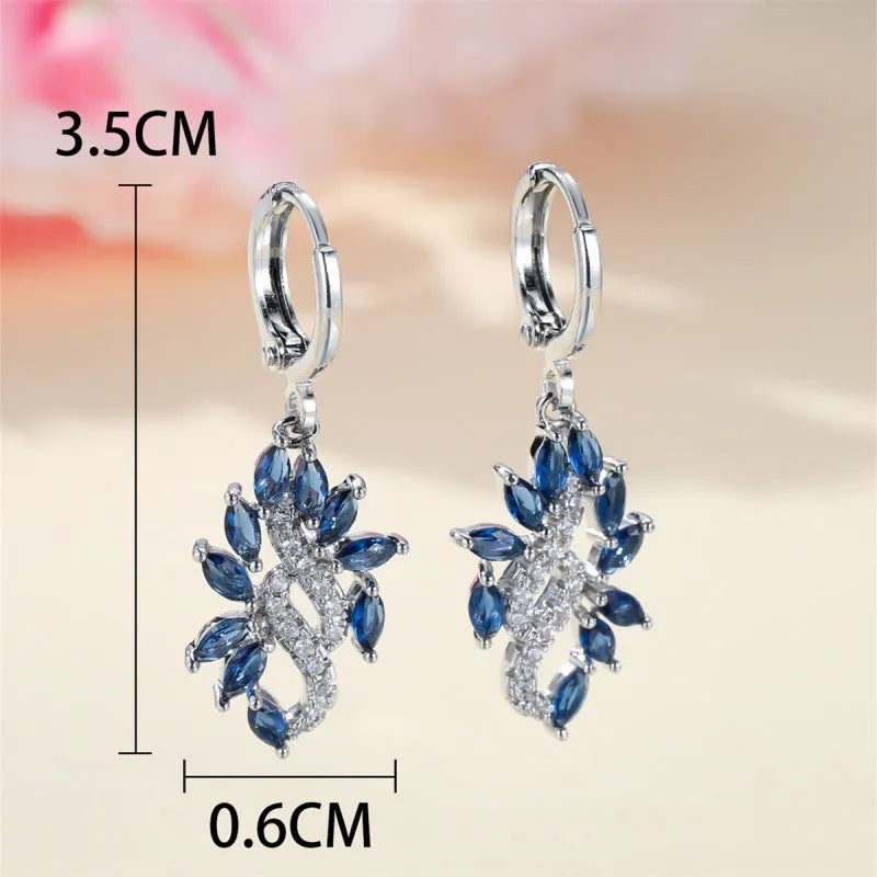 Women's alloy drop earrings with blue crystal stones in a platinum sapphire blue colour