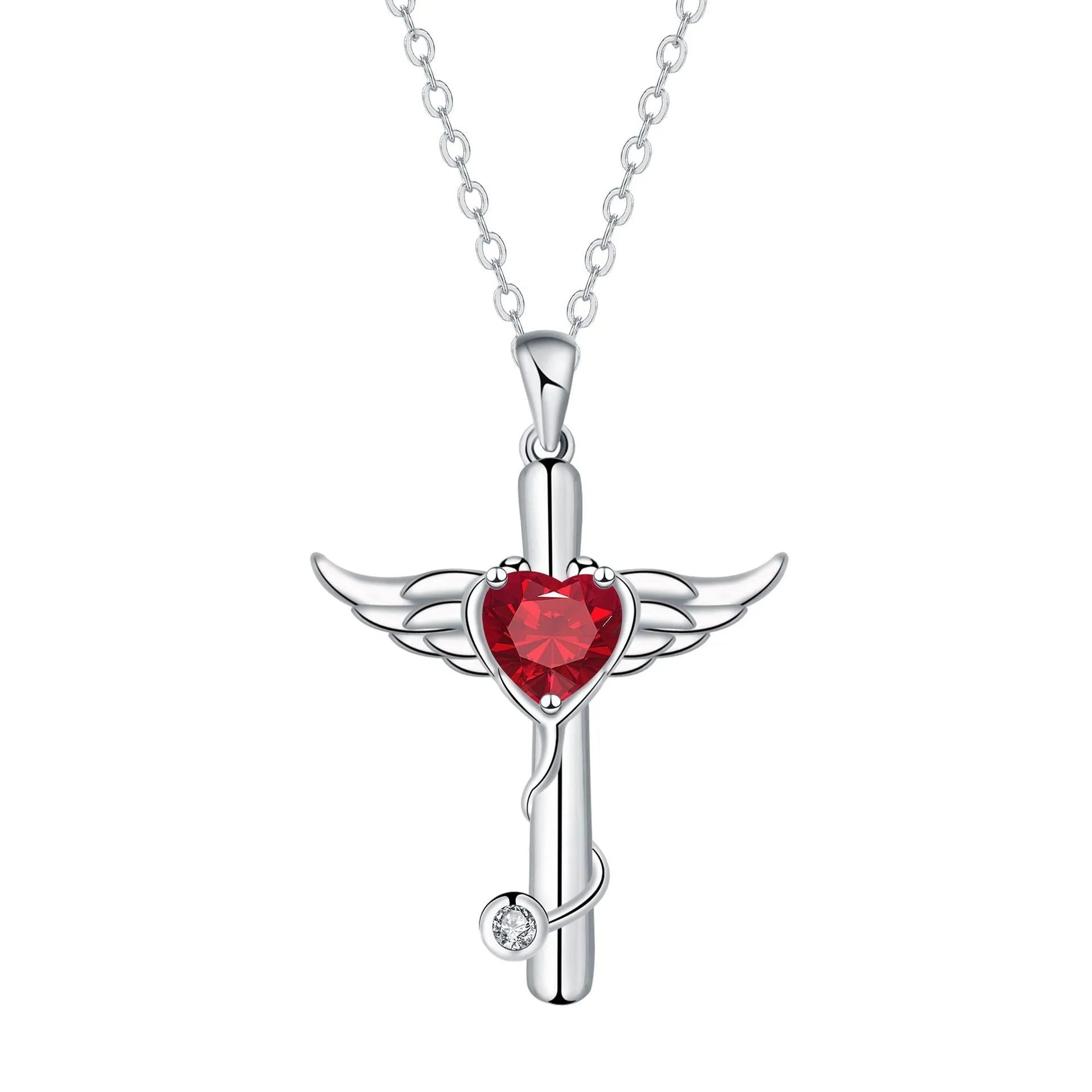 Close-up of a women's necklace with a cross, stethoscope, and wings pendant in electroplated copper.